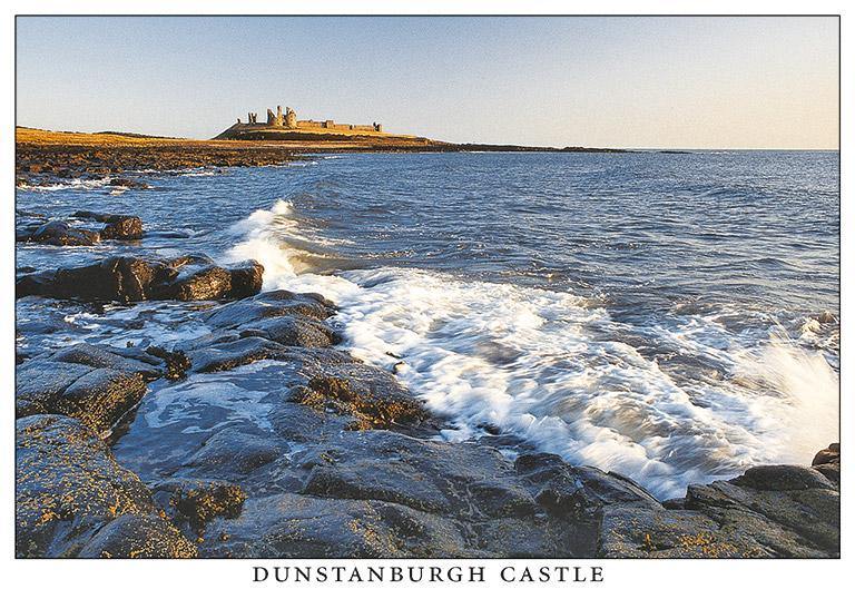 Dunstanburgh Castle from shore postcard | Cardtoons Publications